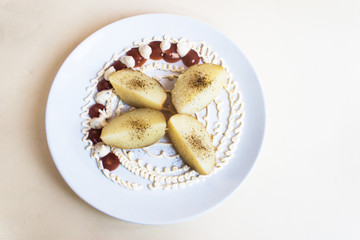 Baked potatoes with assorted sauce and ground black pepper on a light background. Candid, copy space.