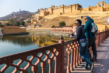 Amer Fort. Tourists by the lake Maota.