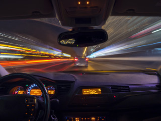 A car driving on a motorway at high speeds