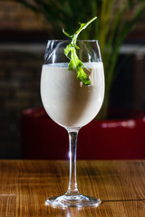 Milk shake with chocolate in glass.