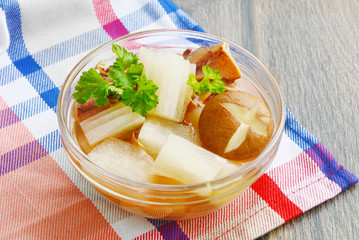 Soup with radish and dried squid is Thailand traditional food .
Clear mild soup with vegetable