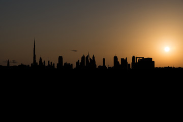 Dubai skyline with different architectural designs seen at sunset