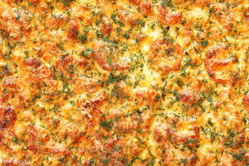 Homemade pizza on parchment from the oven