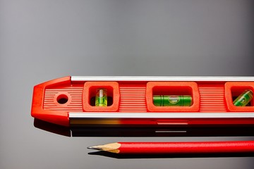 Optical level lies on the surface of the floor