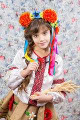 Portrait of young girl in traditional ukrainian style.