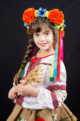 Portrait of young girl in traditional ukrainian style.