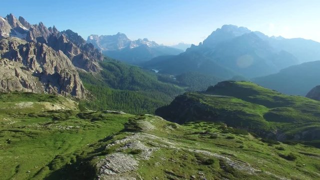 AERIAL VIEW: flight over National Park Tre Cime Di Lavaredo. Italian Dolomite