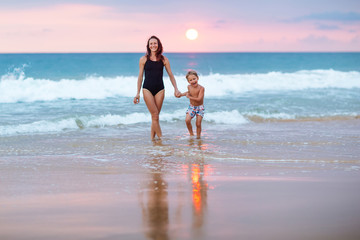 A family is having fun at the seashore