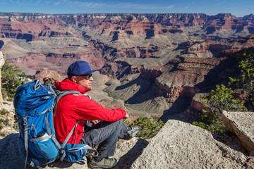 Fototapeta premium A hiker in the Grand Canyon National Park, South Rim, Arizona, USA