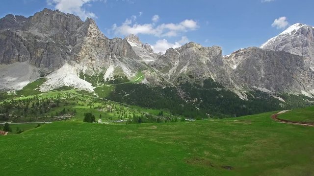 AERIAL VIEW: flight over Passo Falzarego. Italian Dolomites alps.camera moves farwards