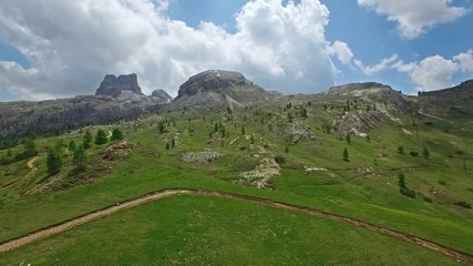 AERIAL VIEW: flight over Passo Falzarego. Italian Dolomites alps.camera moves farwards