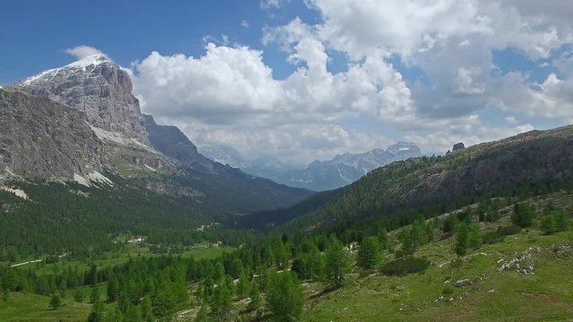 AERIAL VIEW: flight over Passo Falzarego. Italian Dolomites alps.camera moves farwards