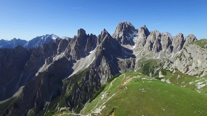 AERIAL VIEW: flight over National Park Tre Cime Di Lavaredo. Italian Dolomite