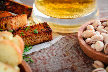 Beer, pistachios and rye croutons