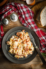 Scrambled eggs with sausage.