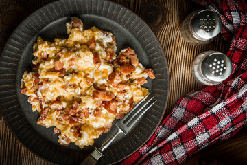 Scrambled eggs with sausage.