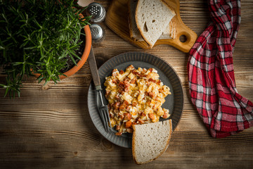 Scrambled eggs with sausage.