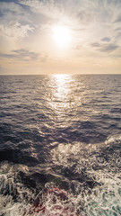 Beautiful huge ocean on a background of the setting sun.