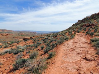 Desert and city panoramic views from hiking trails around St. George Utah around Beck Hill,...