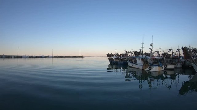 Fishing boats at the end of the day, harbour of San Benedetto del Tronto, Italy