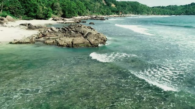 Aerial footage of rock on NAMPU beach, South Yogyakarta, Indonesia - March, 2018