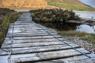 Footbridge at Loch Muick. Cairngorms National Park. Ballater, Aberdeenshire, Scotland, UK. Royal Deeside.