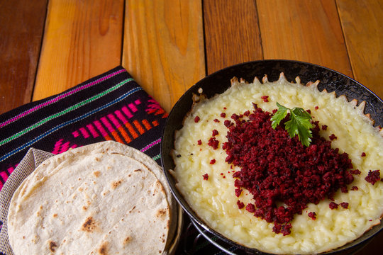 Mexican melted cheese with Chorizo