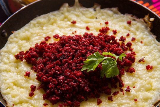 Mexican melted cheese with Chorizo