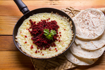 Mexican melted cheese with Chorizo