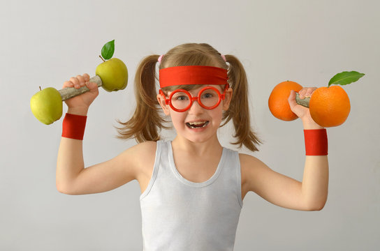 Kid, Child, Lifts Weights From Apples Oranges.