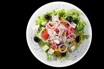 Closeup of Greek Salad on black background