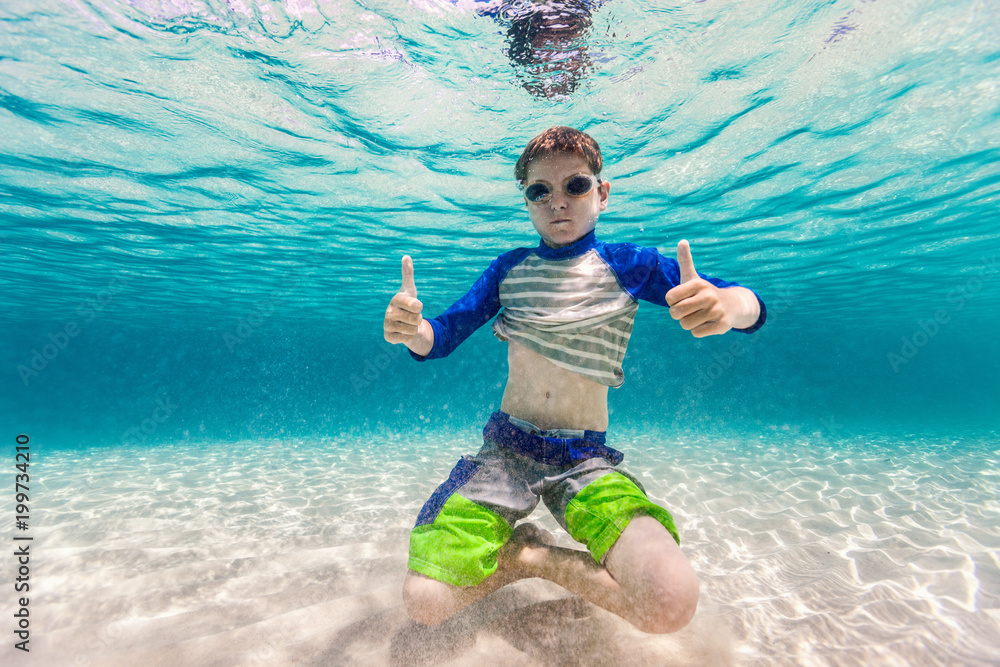 Sticker boy swimming underwater