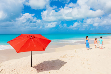 Mother and kids at tropical beach