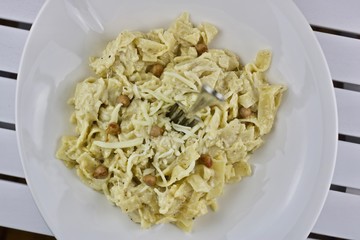 Tasty pasta on white plate
