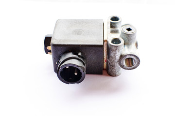 Electromagnetic control valve lifting and lowering the body platform, opening the sides of the...