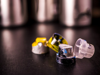 graffiti supplies spray paint close up black surface