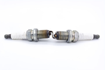 Old spark plug isolated on the white