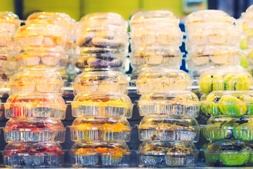 Thai desserts in plastic packaging tone vintage