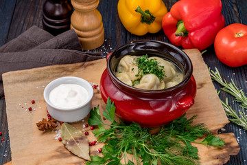 Dumplings with sour cream and herbs