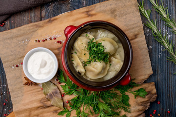 Dumplings with sour cream and herbs