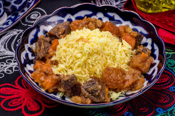 Pilaf sweet with lamb and raisins