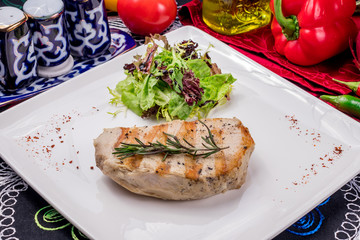 Turkey steak on plate