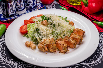 Caesar salad with salmon
