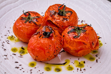 Baked tomatoes on a plate
