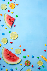 Fruits on blue background with copy space