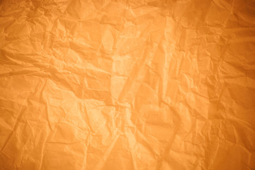 Brown crumpled paper background.