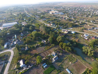 View from the top of the village. Houses and gardens. Countryside, rustic landscape. Aerial photography