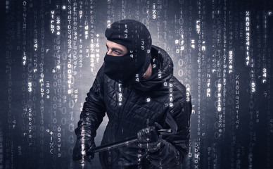 Burglar in action with encoded concept and his tools in his hand. 