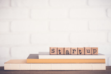 The word Startup and blank space background.