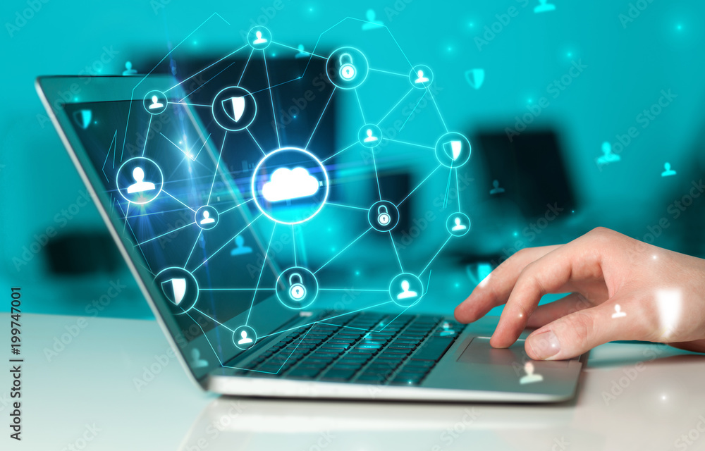 Aufkleber Hand using laptop with centralized cloud computing system and network security concept

